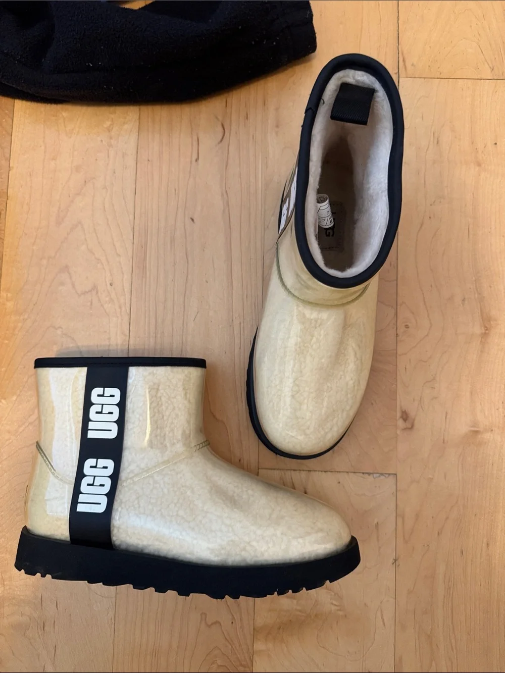 UGG women’s Cream Mini Waterproof Boot with Black Trim